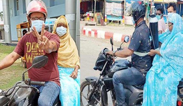 পিঠে সিলিন্ডার বেঁধে হাসপাতালে নেয়া মা সুস্থ হয়ে বাড়ি ফিরলেন